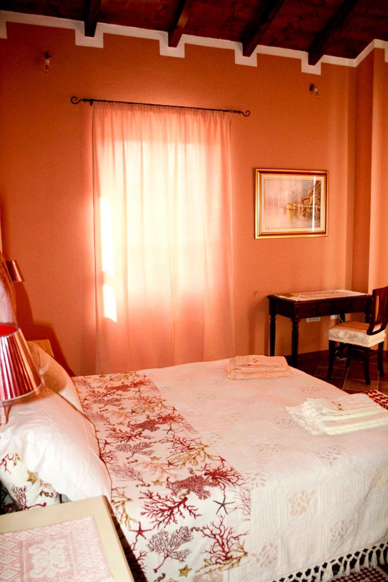 B&B Guest House Il Porto Vecchio Stintino Habitación foto