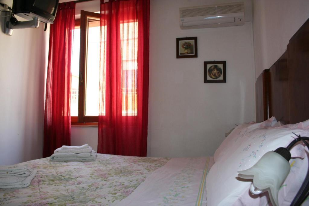B&B Guest House Il Porto Vecchio Stintino Habitación foto