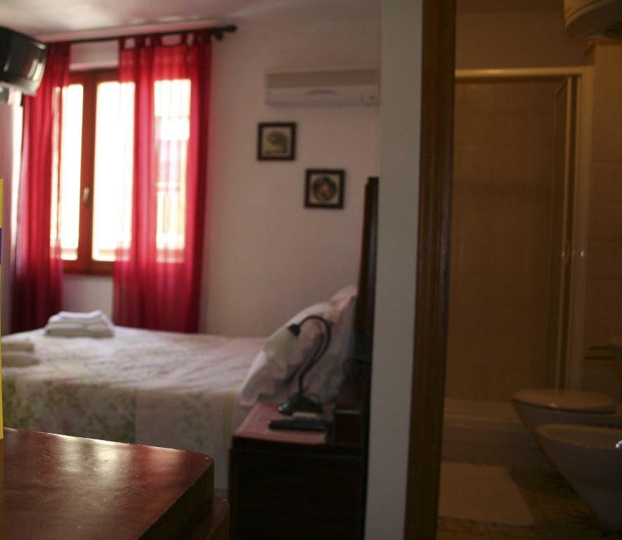 B&B Guest House Il Porto Vecchio Stintino Habitación foto